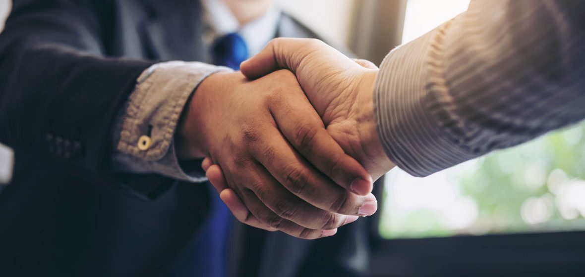 Two men shaking hands