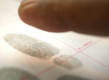 Male getting fingerprinted