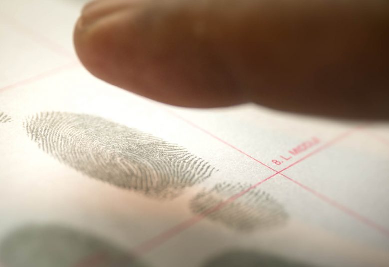 Male getting fingerprinted