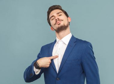 Man pointing at himself