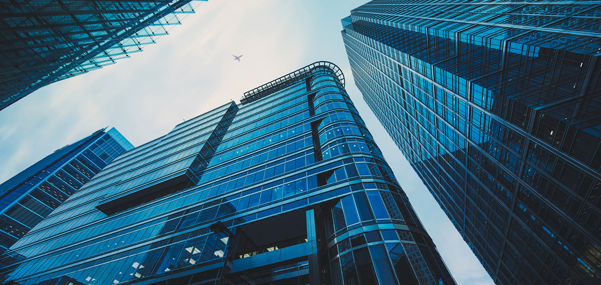 Exterior of glass office buildings in a city