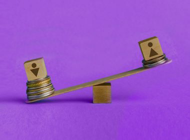 Image of unbalanced scale on purple background