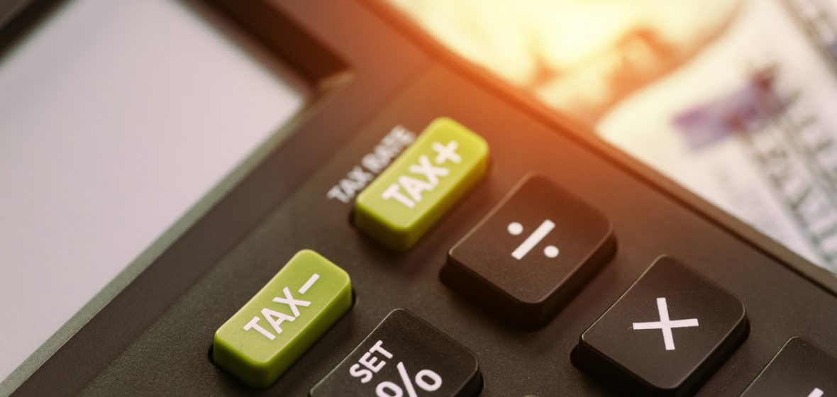 Close-up of calculator with tax buttons