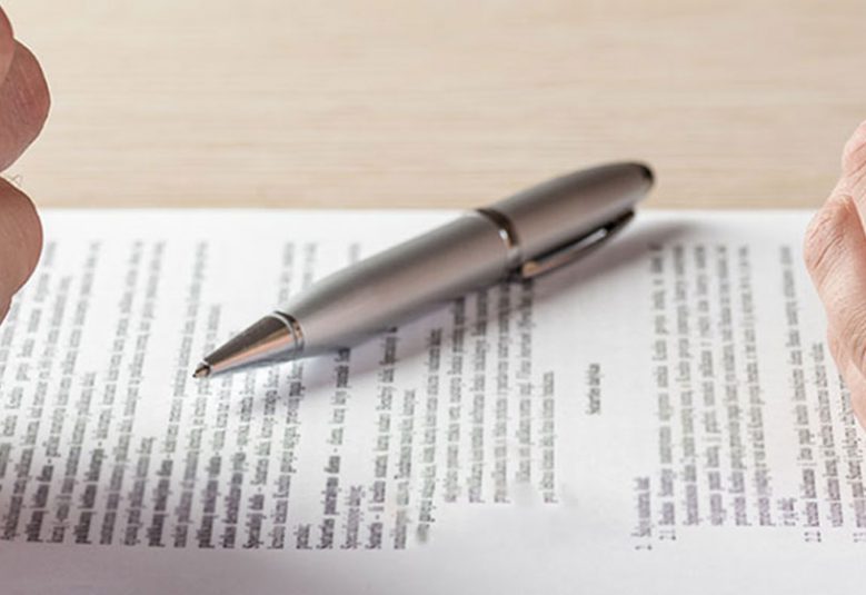 Couple looking at a divorce document