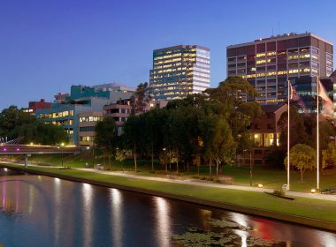 City skyline with a river in the foreground